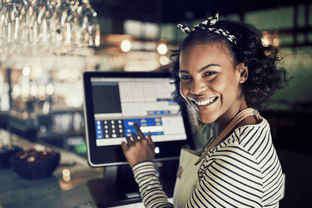 waitress using traditional POS system